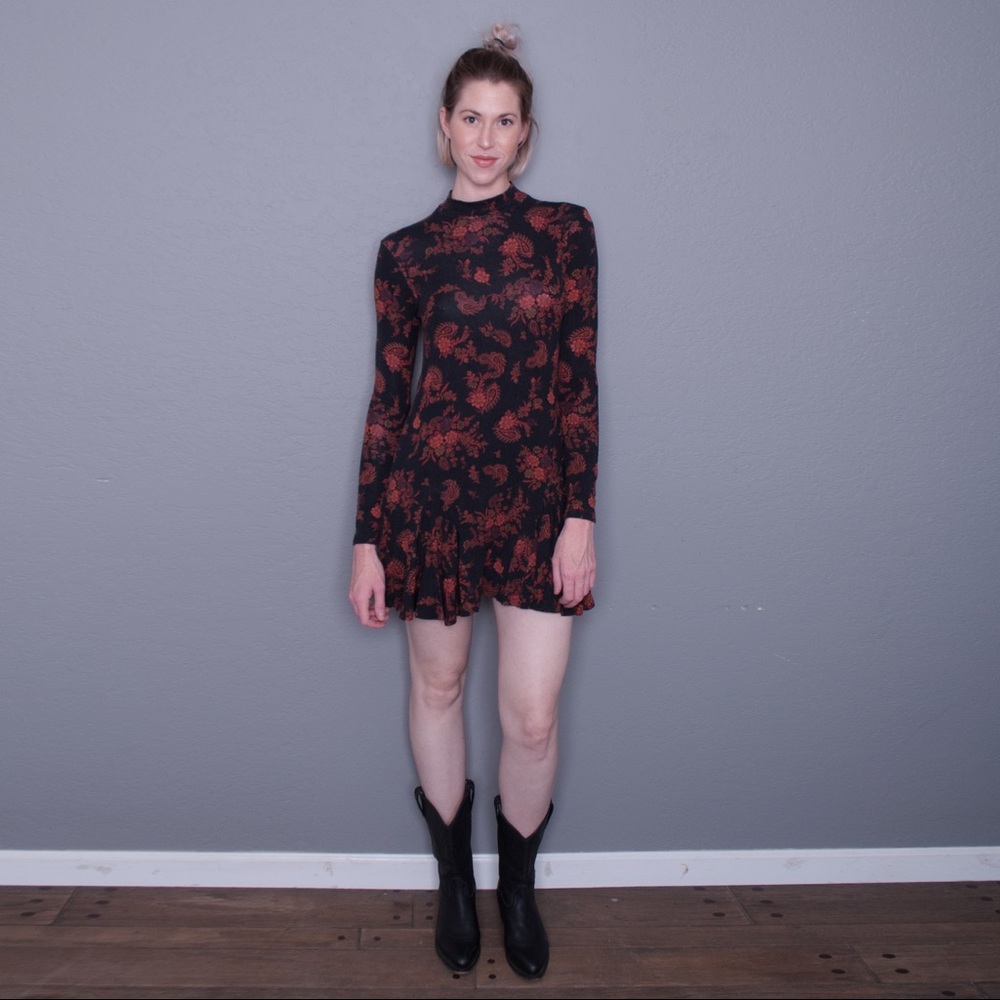 Long sleeve fit and flare dress.